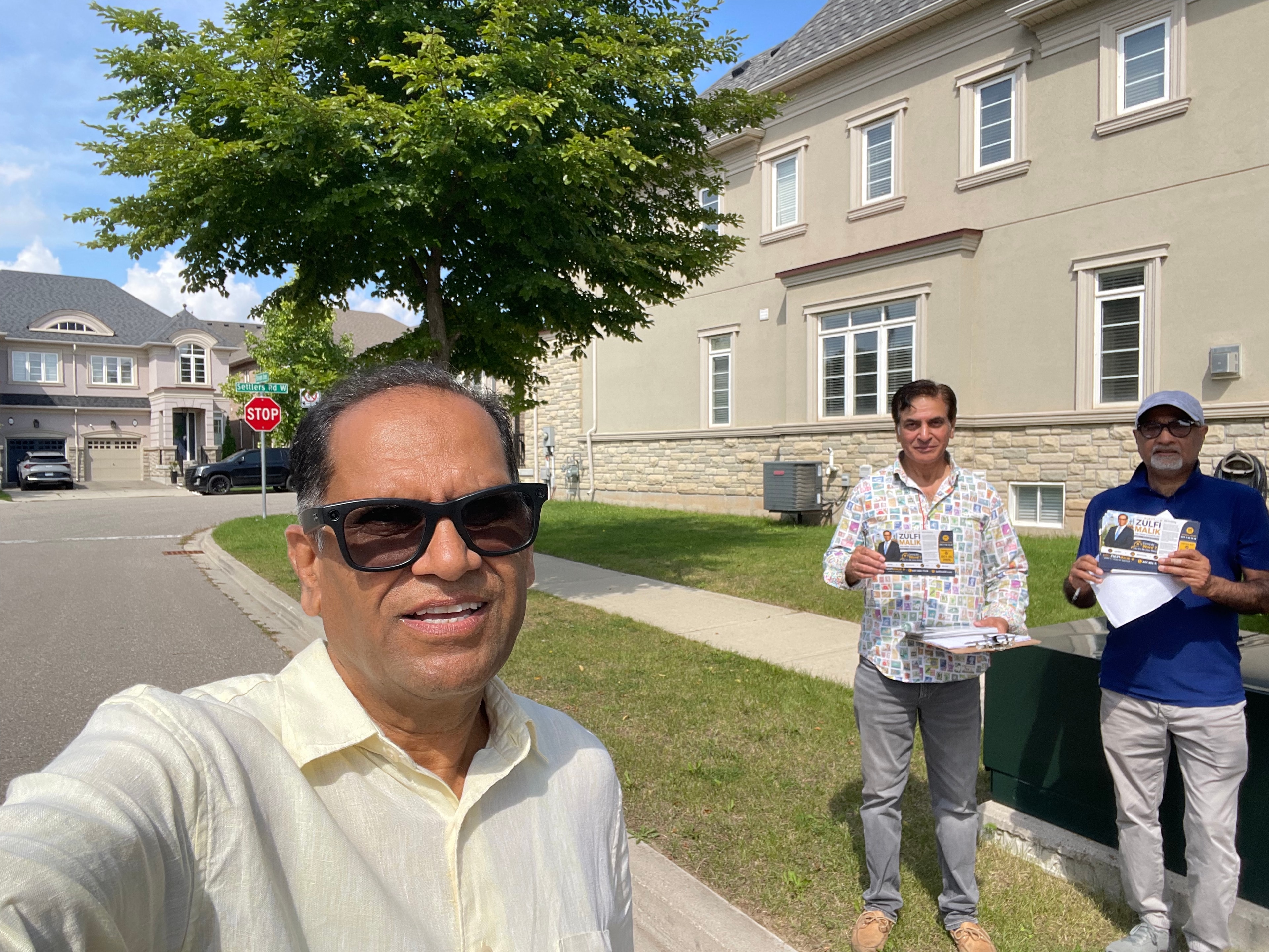 Zulfi Malik with volunteers during Ward 7 campaign